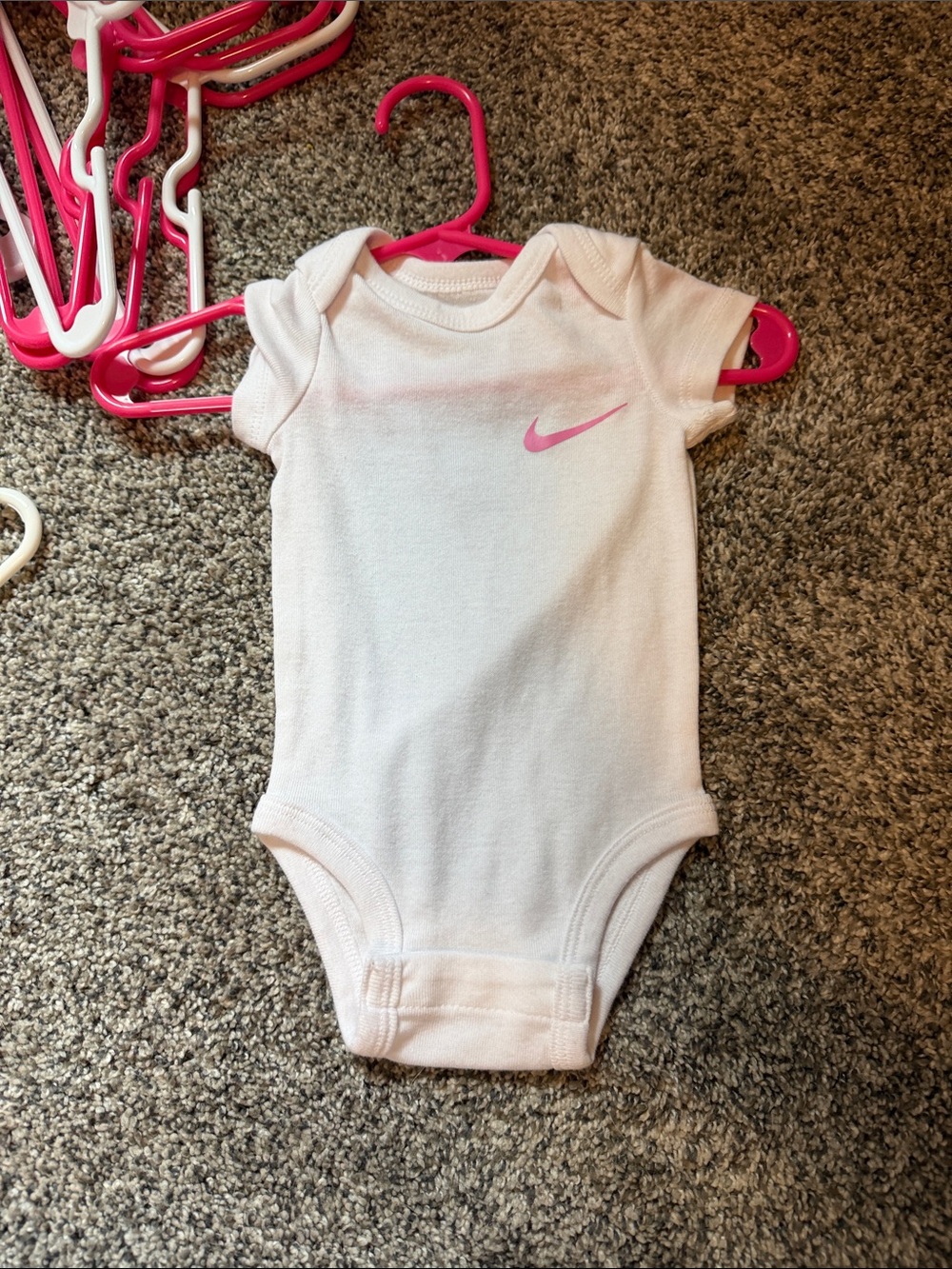 Nike Light Pink Baby One-Piece Bodysuit with Pink Swoosh